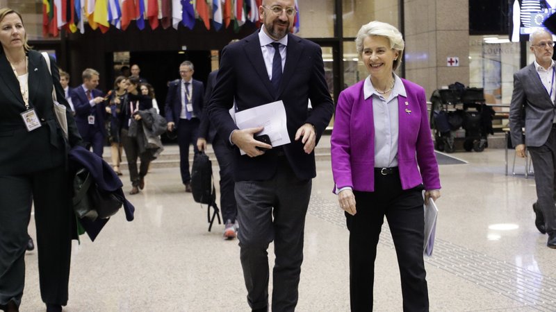 epa10255927 European Council President Charles Michel and European Commission President Ursula von der Leyen on the way to a press conference at the end of first day of an EU Summit in Brussels, Belgium, 21 October 2022. EU leaders reached an agreement on Energy prices and agreed to work on measures to contain energy price.  EPA-EFE/OLIVIER HOSLET