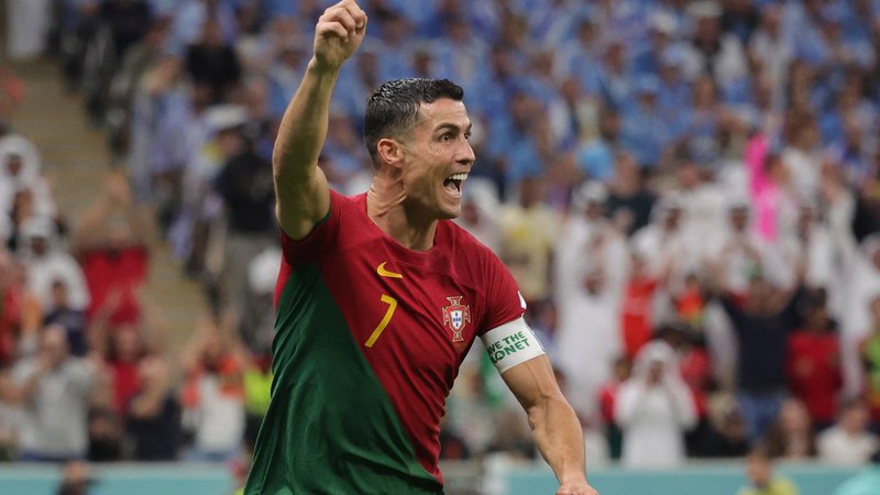 epa10335298 Cristiano Ronaldo of Portugal celebrates after scoring the 1-0 during the FIFA World Cup 2022 group H soccer match between Portugal and Uruguay at Lusail Stadium in Lusail, Qatar, 28 November 2022.  EPA-EFE/Abir Sultan
