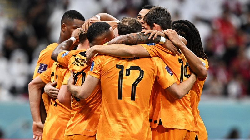 epa10336631 Frenkie de Jong of the Netherlands (unseen) celebrates with his teammates after scoring the 2-0 goal during the FIFA World Cup 2022 group A soccer match between the Netherlands and Qatar at Al Bayt Stadium in Al Khor, Qatar, 29 November 2022.  EPA-EFE/Noushad Thekkayil